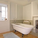 Enjoy a soak in this roll top bath, in the first floor family bathroom