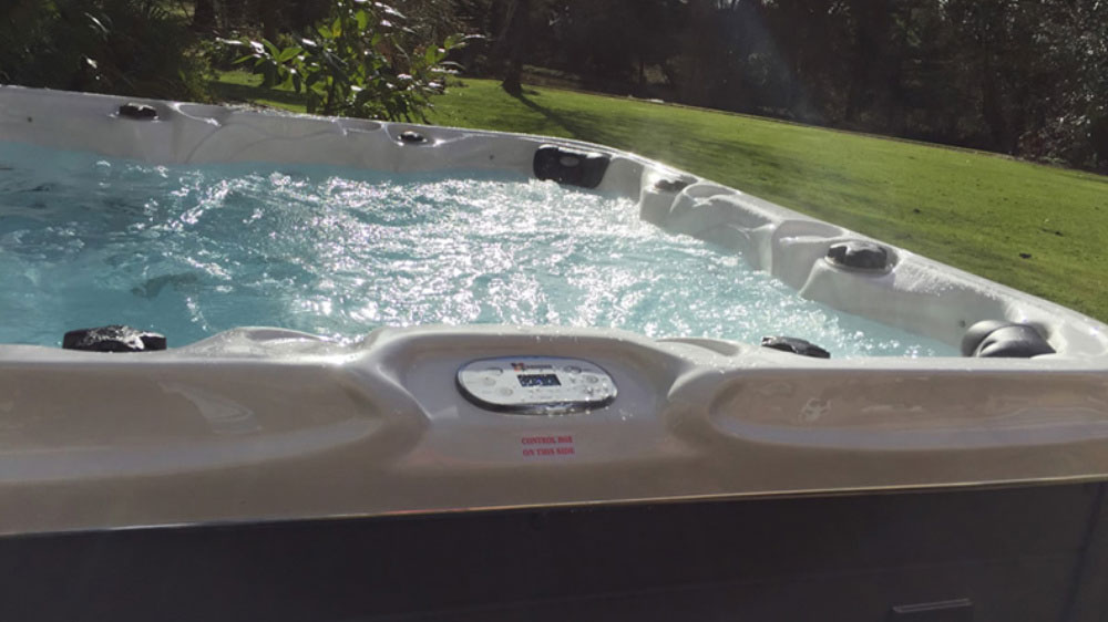 The large hot tub at Tone Dale House is a perfect place to relax with friends in the garden.