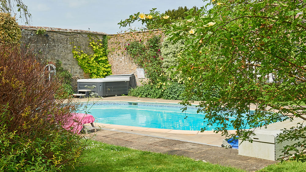 This big holiday house in Somerset has an outdoor pool, hot tub and large stunning gardens
