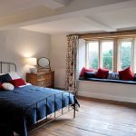 There are 6 bedrooms on the first floor and 4 bedrooms on the second floor at Cotswold Manor