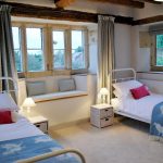 Cotswold Manor has 10 bedrooms for up to 22 guests