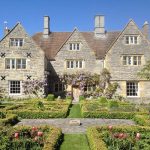Cotswolds Manor is a honey coloured large manor house with beautiful gardens and lots of original features
