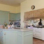 The spacious country style kitchen has a 4 oven Aga and a separate cooker too