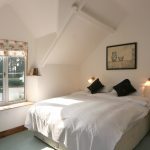 Thatchers bedroom in the Cottage can be made up as either 2 single beds or a 6 foot kingsize bed