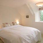 The Dovecote bedroom at Widcombe Grange, Somerset. For hire through The Big House Company