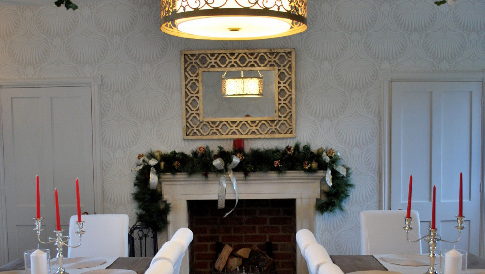 The dining room decorated for a Christmas family gathering, organised by The Big House Company at Cotswold Manor