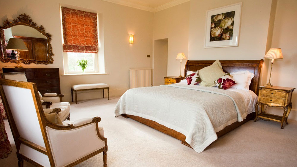 The bedrooms at Somerset Manor are spacious and comfortable for a memorable big house experience in Somerset