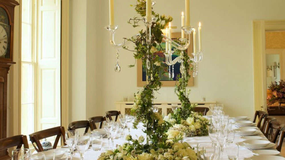 The dining room laid up for a celebration dinner arranged by The Big House Company in Somerset