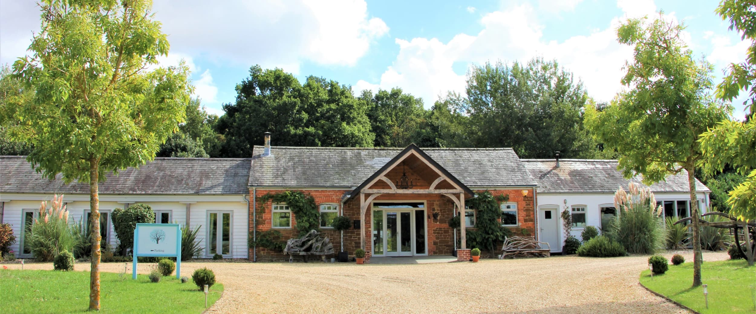 This holiday house in Norfolk sleeps 18 in 7 bedrooms, around an attractive courtyard garden