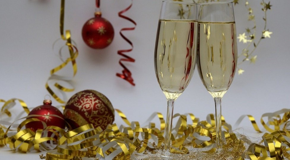 Champagne and christmas baubles at a winter wedding in Somerset