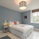 Bedroom 3, decorated in pretty pale pastels has a superking bed