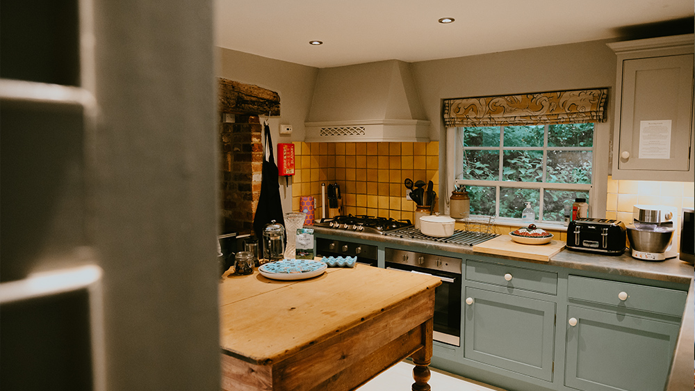 A large country style kitchen, with Aga and range cooker too!