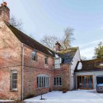 Our big house in Dorset has a hot tub that's a perfect spot to relax on a crisp, snowy day.