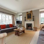 The sitting room at Dorset Lodge is delightfully cosy in the winter time with the log fire roaring.