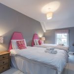 Bedroom 6 has twin beds