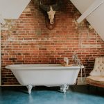 A stunning bathroom with roll top bath for a relaxing soak during your stay