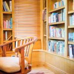 The small library has a secret doorway from the oak panelled hallway at Tatham House