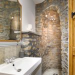 This stunning stone shower is in one of the ground floor bedrooms