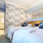 Tatham House sleeps up to 22 people in 10 large en-suite bedrooms