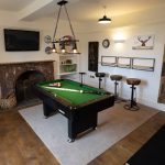 The games room for hours of fun playing pool. Perch on the bar stools and enjoy the action