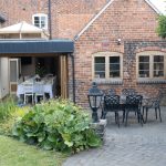 The dining room with bi-fold doors to the terrace