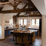 The country style kitchen links to the dining area for a lovely open plan feel