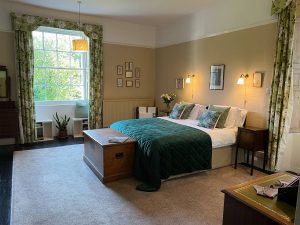 Bright Garden Room bedroom at Tone Dale House with garden views.