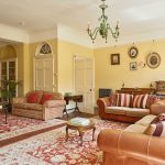 Tone Dale House - the elegant drawing room has large windows overlooking the garden