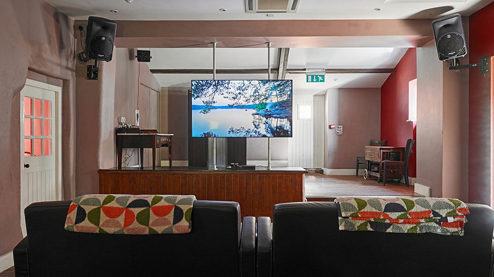 Tone Dale House - Cinema/Party Room; watch a movie or push the sofas back and enjoy some after dinner dancing