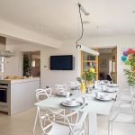 The breakfast table looks out towards the terrace