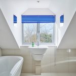 Bedrooms 5 & 6 share this sleek bathroom