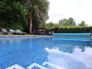 The outdoor heated pool will be a big hit with any children in your group