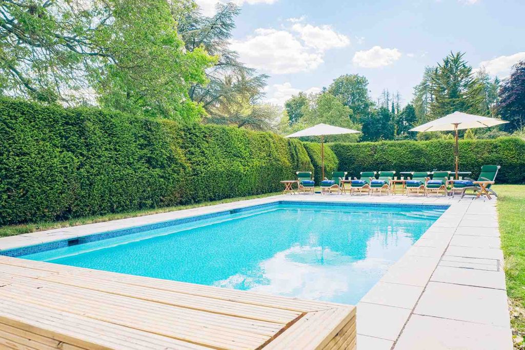 Outdoor swimming pool at Tysoe Manor Cotswolds holiday rental