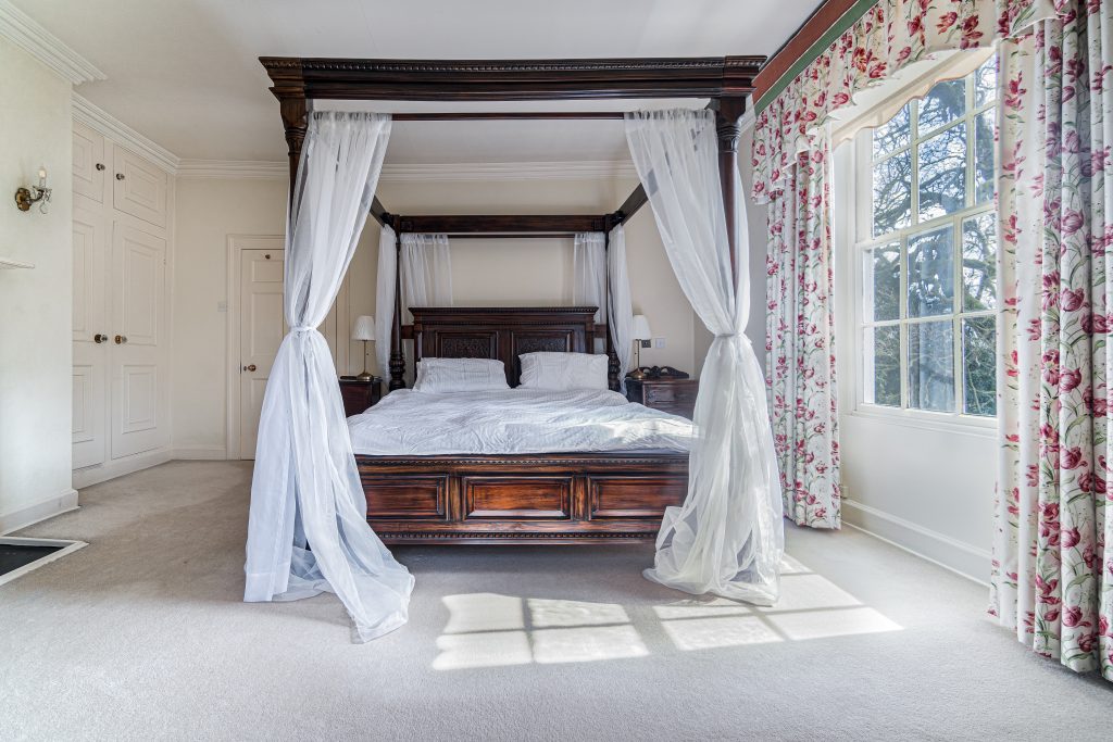 Bedroom 1 - Professional Four-poster bedroom suite at Riverside House with period character.