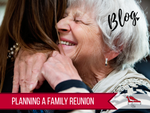 Older lady meeting family member at a reunion in a big house